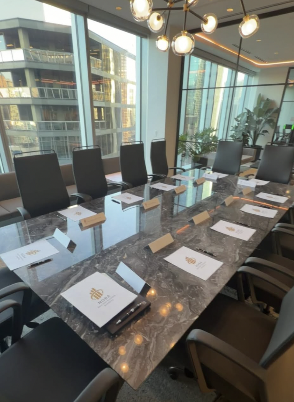 NGBA branded materials laid out on the boardroom table